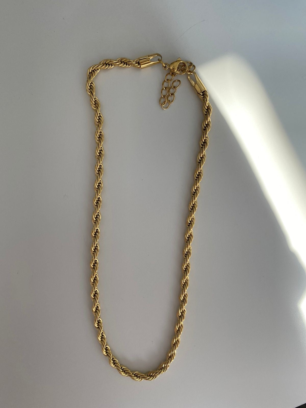 Woven bow necklace